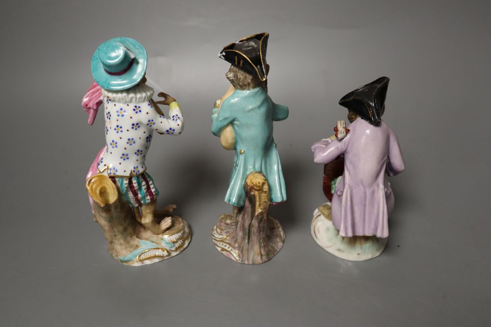 Six 19th century Meissen monkey band figures and another Volkstedt example, tallest 15cm
